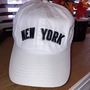 White New York cap.